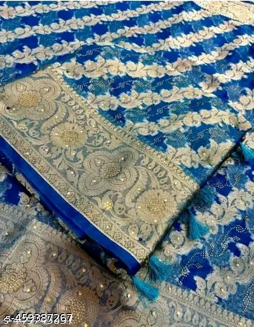 Abhisarika Fabulous Sarees” features beautifully woven Organza sarees with Zari work and Jacquard blouses, designed for festive and elegant wear.